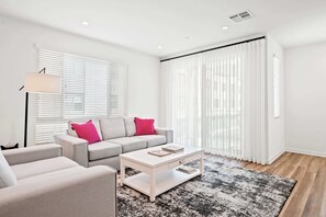 Townhome, 1 King Bed, Patio, Garden View (148 B, Irvine-2) | Living area | 42-inch flat-screen TV with digital channels