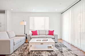 Townhome, 1 King Bed, Patio, Garden View (148 B, Irvine-2) | Living area | 42-inch flat-screen TV with digital channels