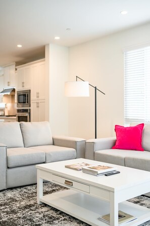 Townhome, 1 Queen Bed, Patio, Garden View (148 A, Irvine-2) | Living area | 42-inch flat-screen TV with digital channels