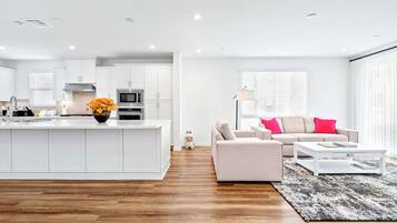 Townhome, 1 Queen Bed, Patio, Garden View (148 A, Irvine-2) | Living area | 42-inch flat-screen TV with digital channels