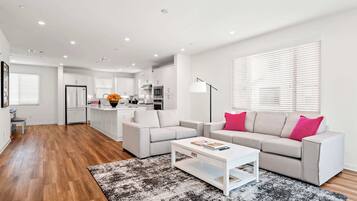 Townhome, 1 Queen Bed, Patio, Garden View (148 A, Irvine-2) | Living area | 42-inch flat-screen TV with digital channels