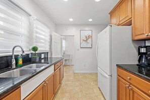 Apartment, 2 Queen Beds, Patio, Garden View (307-3 Alhambra) | Private kitchen | Fridge, microwave, oven, stovetop