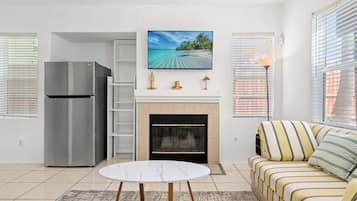 House, Multiple Beds, Patio, Garden View (22421 Moreno Valley) | Living area | 42-inch flat-screen TV with digital channels, fireplace