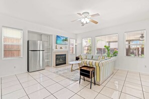 House, Multiple Beds, Patio, Garden View (22421 Moreno Valley) | Living area | 42-inch flat-screen TV with digital channels, fireplace