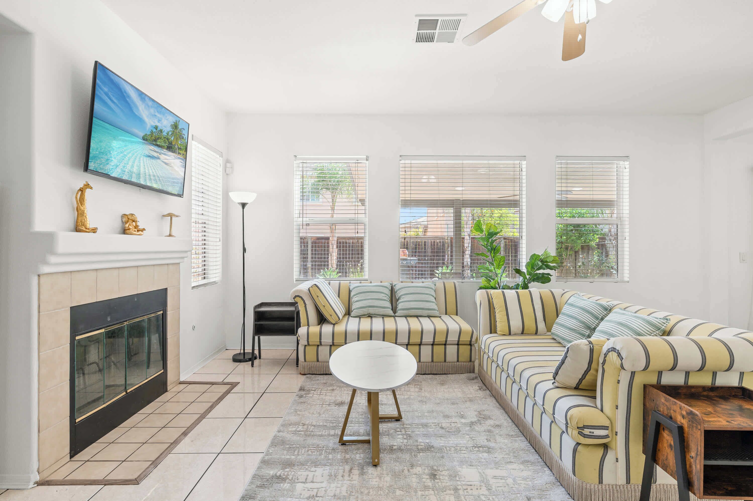 House, Multiple Beds, Patio, Garden View (22421 Moreno Valley) | Living area | 42-inch flat-screen TV with digital channels, fireplace