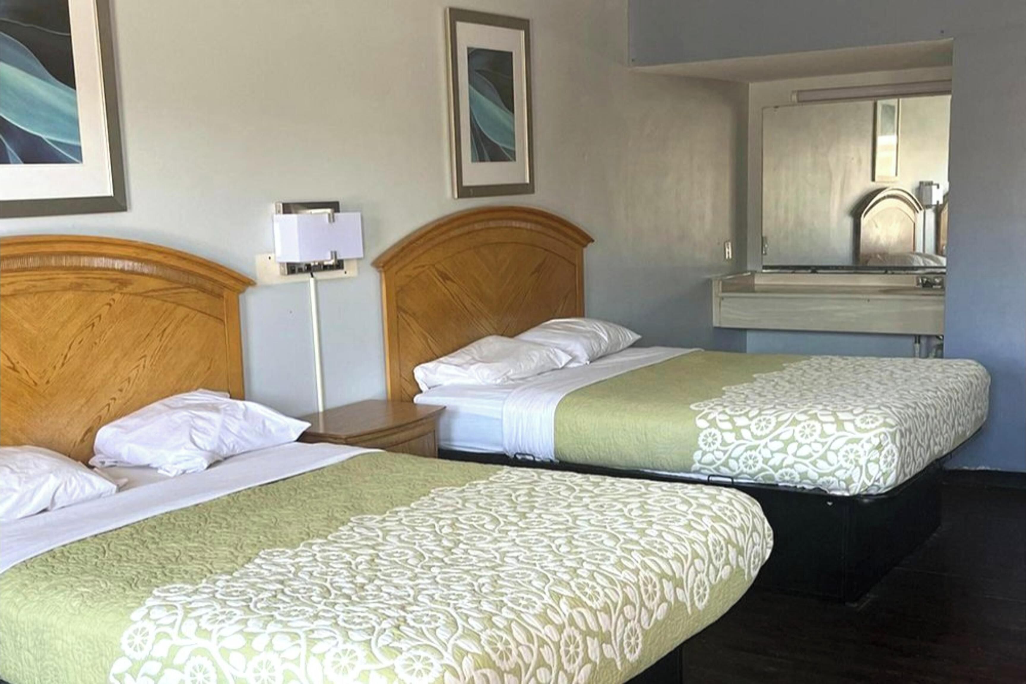 Room, 2 Queen Beds, Non Smoking | Desk, iron/ironing board (on request), WiFi (free), bed sheets
