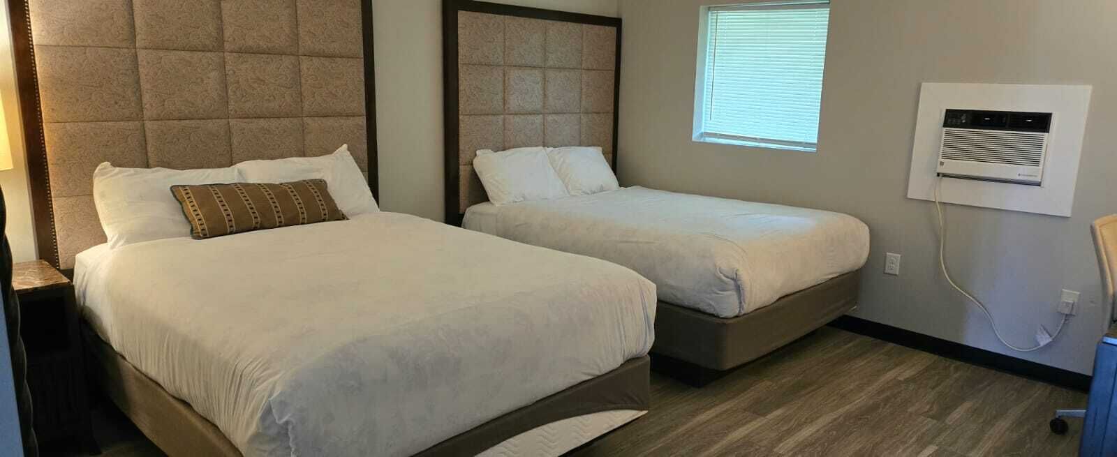 Room, 2 Queen Beds | Desk, iron/ironing board, free WiFi, bed sheets