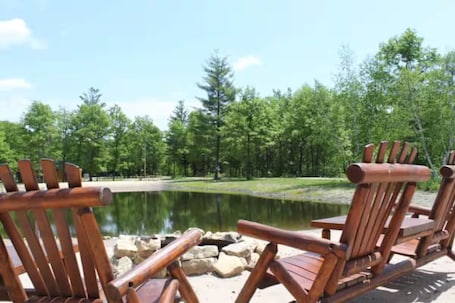 Property grounds. Charming 2-bedroom Loft cabin in serene New Lisbon