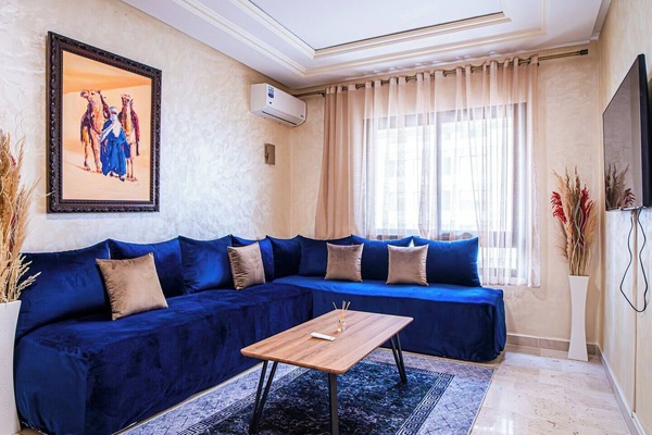 Comfortable living room, offering a pleasant space to relax and enjoy the view.