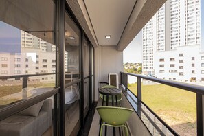 Premium Double Room, City View | Balcony