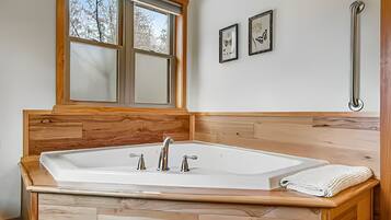 Shower, jetted tub, hair dryer, towels