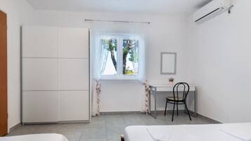 3 habitaciones, tabla de planchar con plancha, wifi y ropa de cama