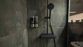 Shower, eco-friendly toiletries, hair dryer, towels