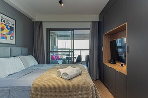 1 bedroom, desk, iron/ironing board, travel crib