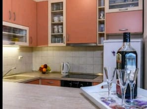 Apartment (Two-Bedroom Apartment With Sea View) | Private kitchen | Fridge