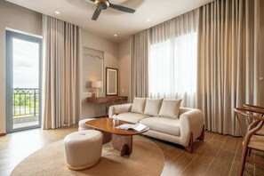 Premium Apartment, Multiple Beds, Balcony, Park View | Living area | Flat-screen TV