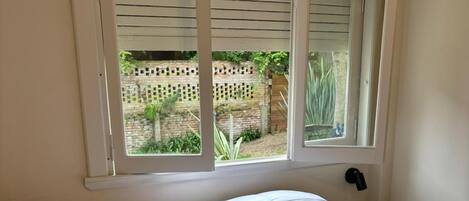 Double Room, Patio, Garden View | In-room safe, blackout curtains, free WiFi