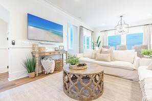 TV connectée, table de tennis de table, livres, chaîne hi-fi