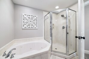Shower, jetted tub, hair dryer, towels