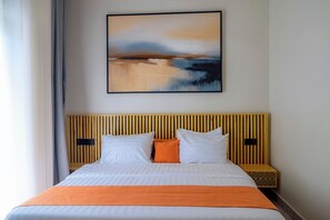 2 habitaciones, tabla de planchar con plancha, wifi y ropa de cama 