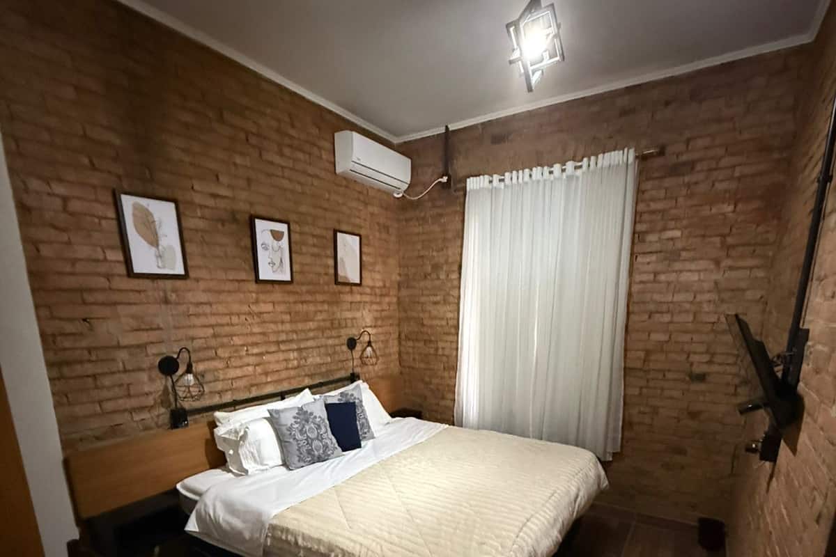 Deluxe Suite, Garden View | Desk, laptop workspace, free WiFi
