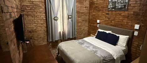 Habitación doble estándar, vista al jardín | Escritorio, espacio para trabajar con laptop y wifi gratis