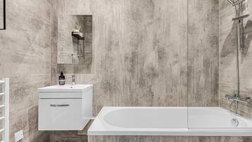 Shower, hair dryer, towels