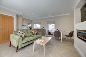 Living area - Modern stone cottage just 20 meters from the beach in Seahouses (Northumberland)
