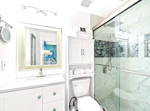Shower, hair dryer, towels, soap