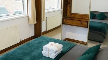 2 bedrooms, iron/ironing board, WiFi, bed sheets