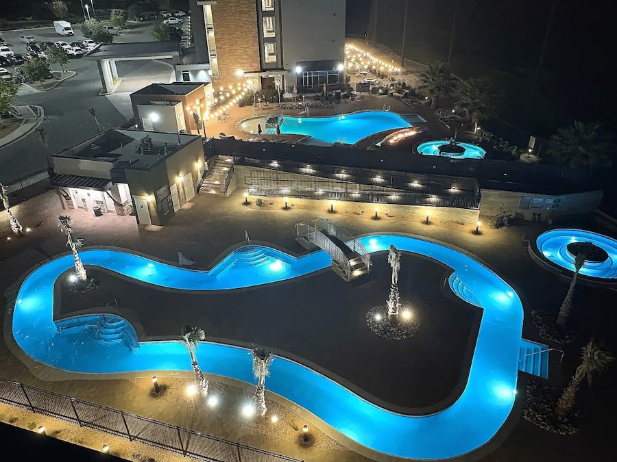 Outdoor pool, open 6:00 AM to 11:00 PM, free cabanas, pool umbrellas