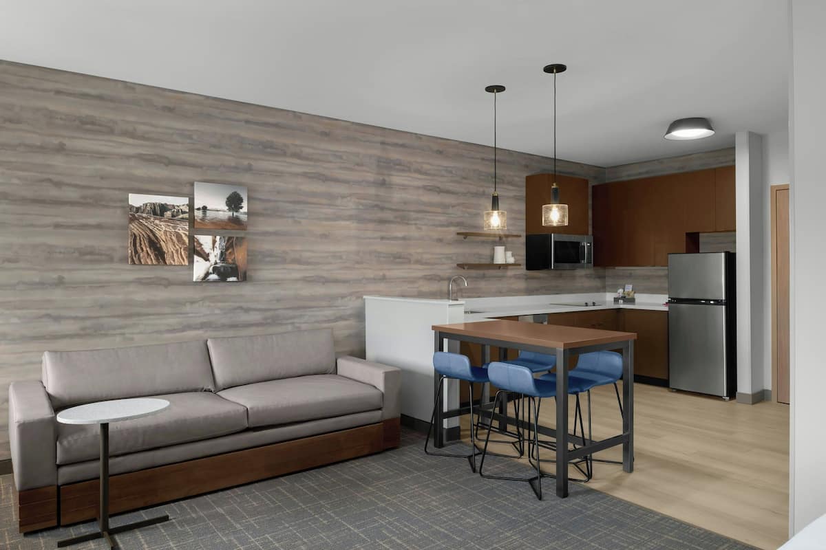 55-inch flat-screen TV with digital channels, Netflix, Hulu