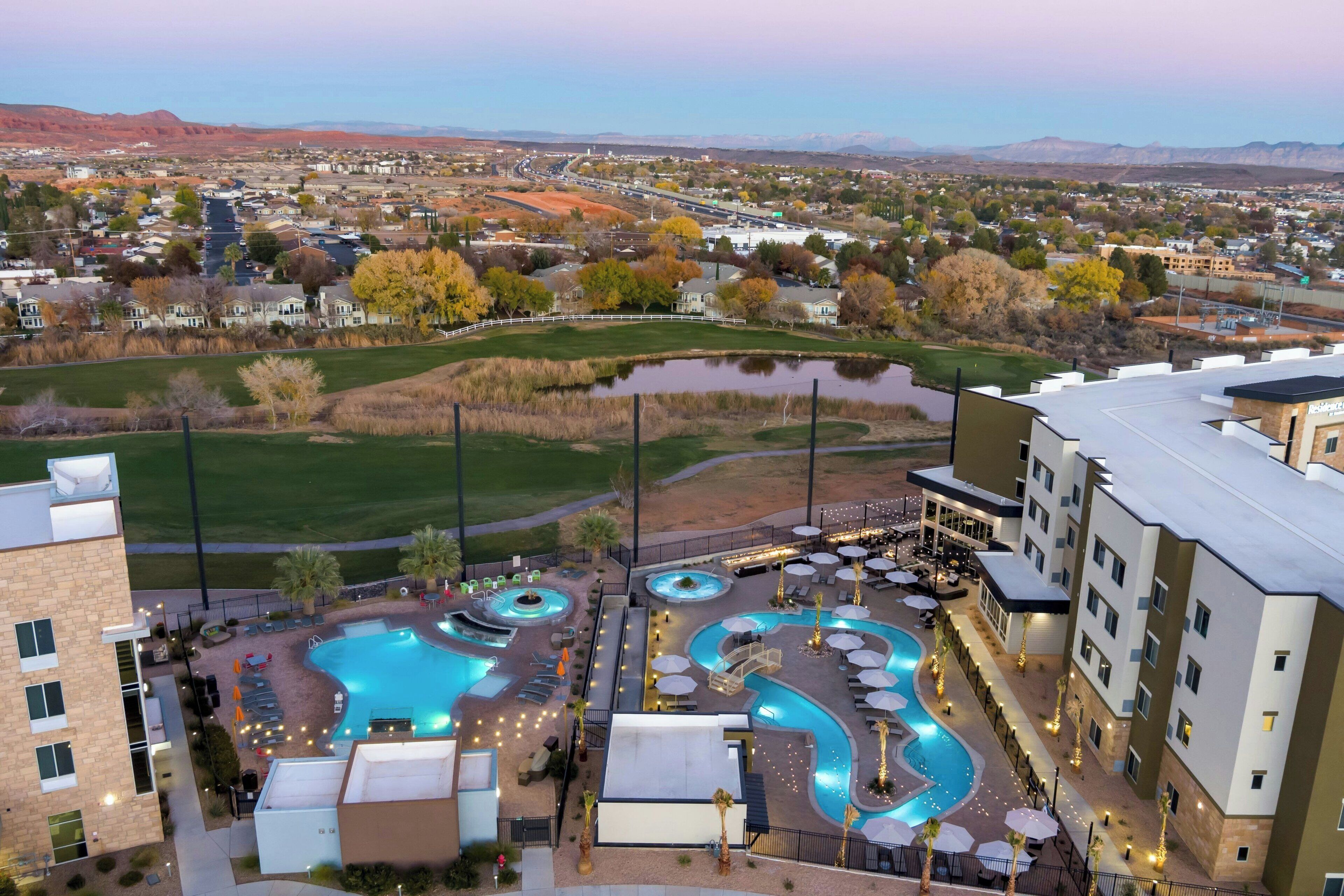 Outdoor pool, open 6:00 AM to 11:00 PM, free cabanas, pool umbrellas