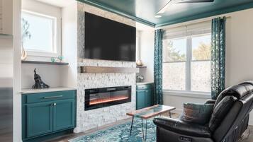 Smart TV, fireplace, books