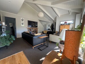 Living area - Papamoa beach house with pool and indoor outdoor living (Tauranga)