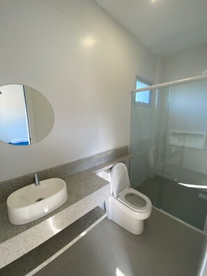 Shower, towels, toilet paper