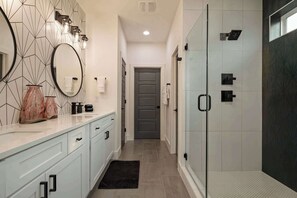 Shower, hair dryer, towels, soap