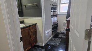 Shower, towels, soap, toilet paper
