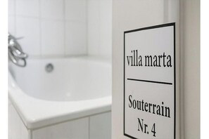 Shower, towels, soap, toilet paper