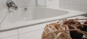 Shower, towels, soap, toilet paper