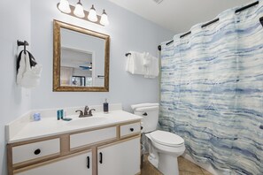 Hair dryer, towels, soap, shampoo