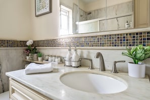 Jetted bath, hair dryer, bidet, towels