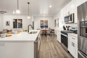 Fridge, microwave, dishwasher, coffee/tea maker