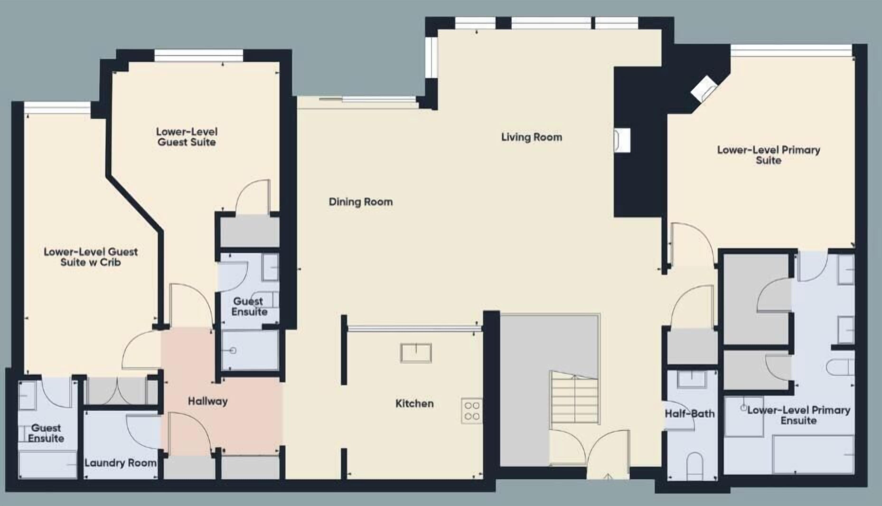 Plano de planta de un hotel que muestra una suite de huéspedes, comedor, sala de estar, cocina, lavadero y un aseo de cortesía.