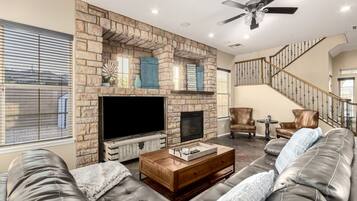 Télévision, cheminée, imprimantes