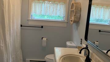 Hair dryer, towels, soap, shampoo