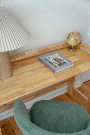 A wooden desk with a lamp, a globe, and a book titled 'Made to Live'. - Private GEM in SC-Pool, Huge Porch, Fenced Yard (Greer)