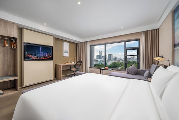 Luxury Double Room, City View | Desk, laptop workspace, soundproofing, iron/ironing board
