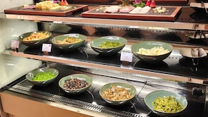 A buffet with various dishes displayed in bowls and trays. - IntercityHotel Shenzhen Futian Huanggang (Shenzhen)