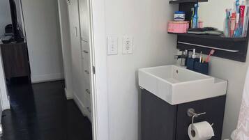 Shower, towels, soap, toilet paper